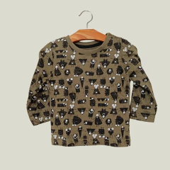 REMERA - PRIMARK - TALLE 6 MESES - VERDE MOTIVO MUÑECOS