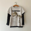 REMERA - H&M - TALLE 4 A 6 AÑOS - BLANCO Y NEGRO MOTIVO DINO - comprar online