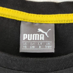 REMERA - PUMA - TALLE 7 A 8 AÑOS - NEGRO CON LEYENDA BORUSSIA DORTMUND - PilchaGo