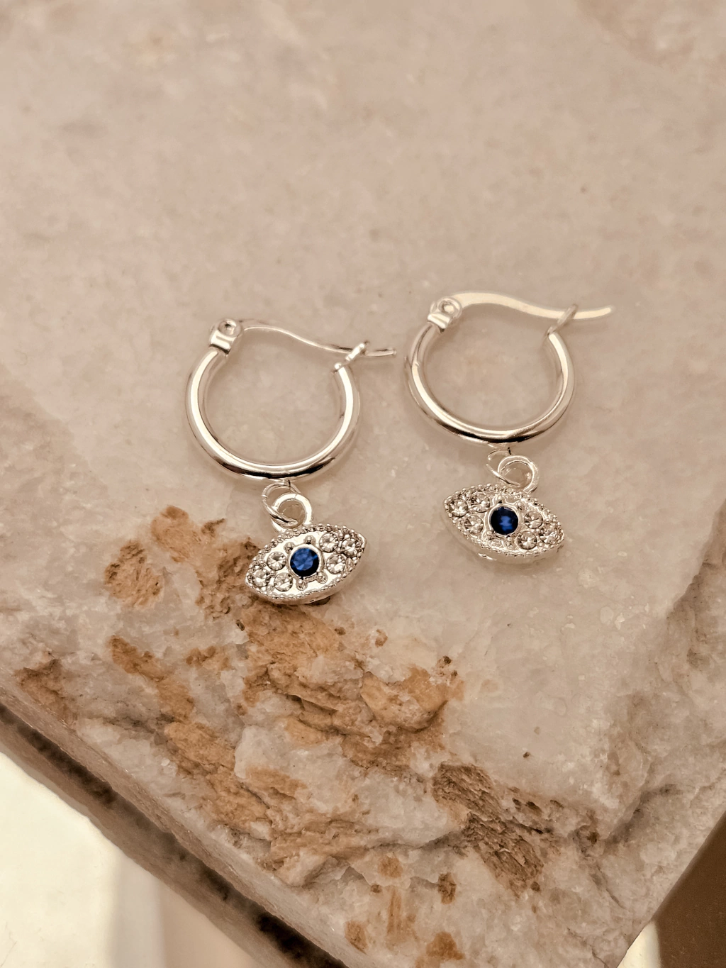 Aros argolla acero blanco dijes ojitos azules