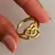 Anillo acero dorado corazón doble - comprar online