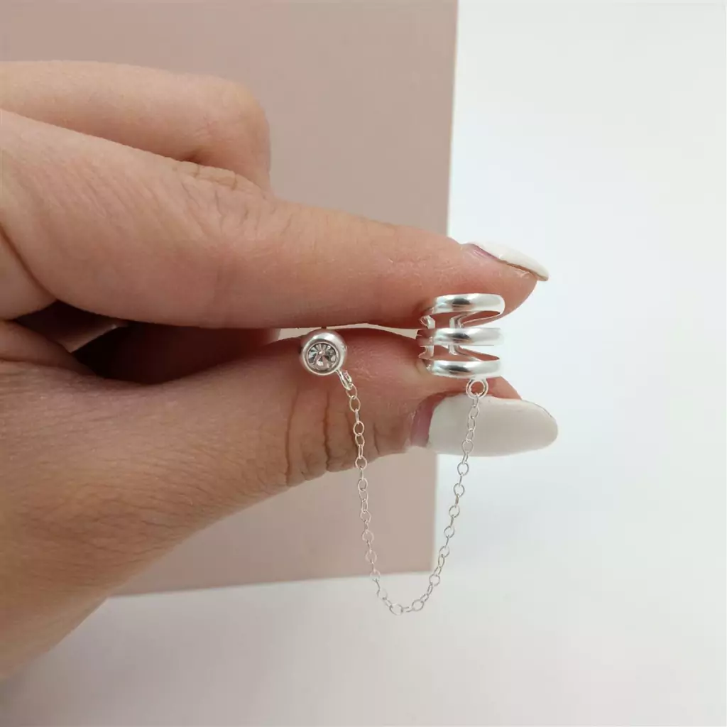 Aros plata cuff cadena y pasante cubic