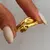 Anillo acero dorado abrazo - comprar online