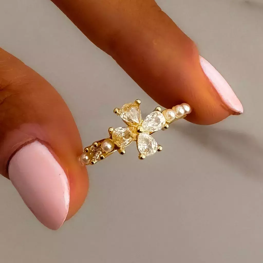 Anillo acero dorado bloom perlas abierto