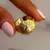 Anillo acero dorado flor perla abierto en internet