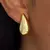 Aros gotas acero dorado 2.5 cm