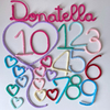 Kit Mesversário Donatella + Coraçõeszinhos