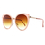 Óculos de Sol Aline Rosa confeccionado em metal de banho dourado com acabamento em acetato rosa e silicone nas hastes. Lente degradê marrom.