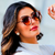Óculos de Sol Aline tartaruga confeccionado em metal de banho dourado com acabamento em acetato estampado e silicone nas hastes. Lente degradê marrom. 