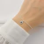 Pulseira Coração Cravejado Ponto de Luz Azul de Prata - comprar online