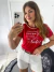 T SHIRT LUXE VERMELHA - EXISTE UM DEUS QUE DO NADA FAZ TUDO - COM PEDRARIAS - comprar online