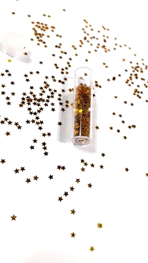 GLITTER FORMA ESTRELLA DORADA x1 U