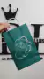 BOLSA NAVIDEÑA VERDE DE PAPEL CON MANIJA x1 U en internet