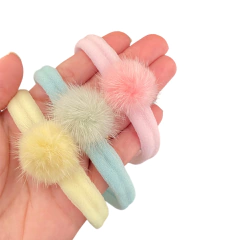 Faixa para bebê pompom (unidade)