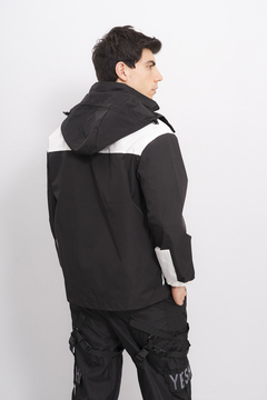 ROMPEVIENTO BICOLOR UNISEX en internet