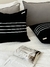 Funda 50x50 Negra Con Lineas Blancas en internet