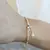PULSERA CON PERLAS Y CADENA TURBILLON - comprar online
