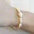 Imagen de PULSERA ELASTIZADA DE CRISTAL y PERLA