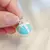 DIJE CON ESMALTE MUFFIN CON MOÑO - comprar online
