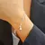 PULSERA CON DIJES