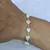 PULSERA CON BOLITAS Y NACAR
