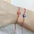 PULSERA DE HILO CON OJO TURCO