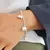 PULSERA CON DIJES
