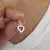 DIJE CORAZON CON CUBIC en internet