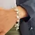 PULSERA CON DIJES