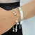 PULSERA CON DIJE
