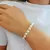 Imagen de PULSERA DE HILO Y PERLAS