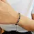 PULSERA DE HILO BOLAS LISAS - EUFROSINA JOYAS