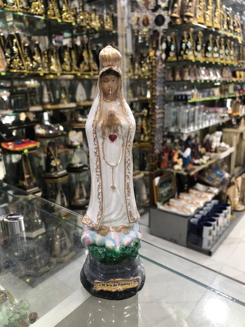 Imagem de Nossa Senhora de Fátima de gesso. Tam. 20cm