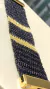 Bracelete em crochê fio metal dois tons preto e ouro, fecho magnético. - loja online
