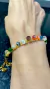 Pulseira 5mm largura, em crochê fio metal ouro, 1 vertente de cristais colors, 15cm + extensor 8cm.