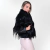 Pellicious coat jacket in smooth natural Tibetan goat fur and goat pelica leather with exclusive design featuring high collar and pocket, feminine woman by Fabiane Frank Fur and Shop, cozy for the autumn-winter cold of 2024-2025. Side black.