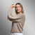 Beige Fendi cropped sweater in knit fabric, soft cashmere, with a woven detail in natural rabbit fur. Women's piece by Fabiane Frank, warm for cold weather. Fall Winter 2025 2026. Gramado. Shop online at Fur Shop.