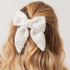 Presilha Laço Tweed Branco na internet