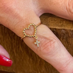 Anel Coração Bolinha e Pingente de Cruz na internet