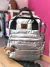 Mochila Maternal Puffer con Cambiador y Porta Mamadera - comprar online