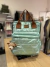 Mochila Maternal Puffer con Cambiador y Porta Mamadera - comprar online