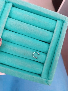 Piercing em aço inox meia lua triângulo - COD. A324F na internet