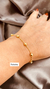 Pulseira 19cm, com sete bolas.