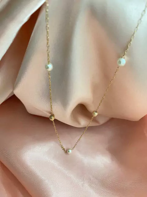 Cod 621. Colar 65cm. Com bolas foscas alternadas e pérolas.