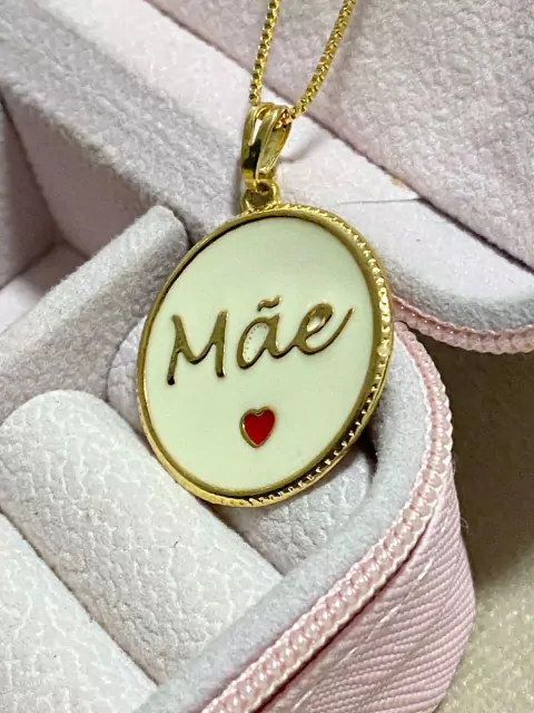Cod 667. Colar 45cm. Pingente medalha ,cor madre perola com escrita(mãe ). - comprar online