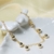 cod;720. Pulseira sete pingentes bolas, folheados a ouro 18k. na internet