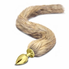 Plug de metal dourado com rabo raposa