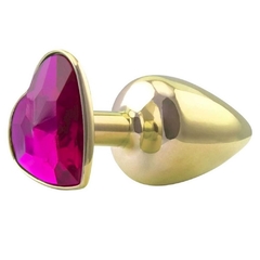 Plug de metal com detalhe em pedra coração 6,5x3cm - dourado