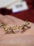 Bow earings golden en internet