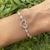 Pulsera corazon en Plata 925 con cubics laterales